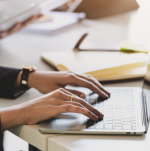 typing on laptop